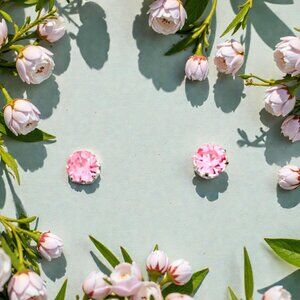 Vintage rose pink cubic zirconia earrings set in a six-prong silver mount